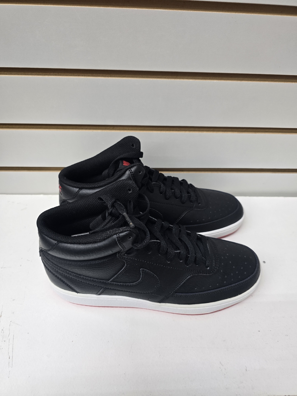 Nike Black High-Top Sneakers with Red Heel Accent
